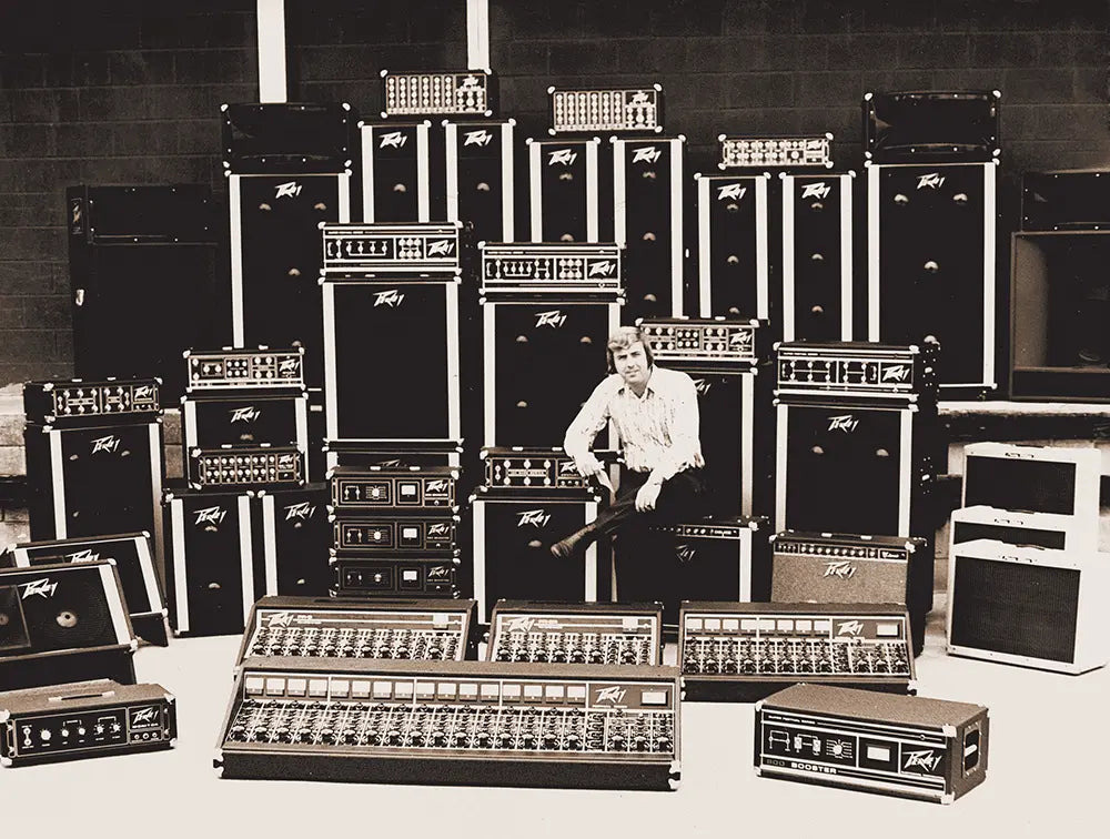 Hartley Peavey sitting collection of Peavey Gear from 1972