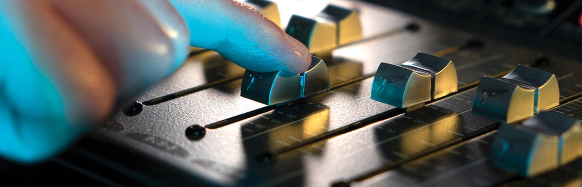 Peavey mixer faders close up